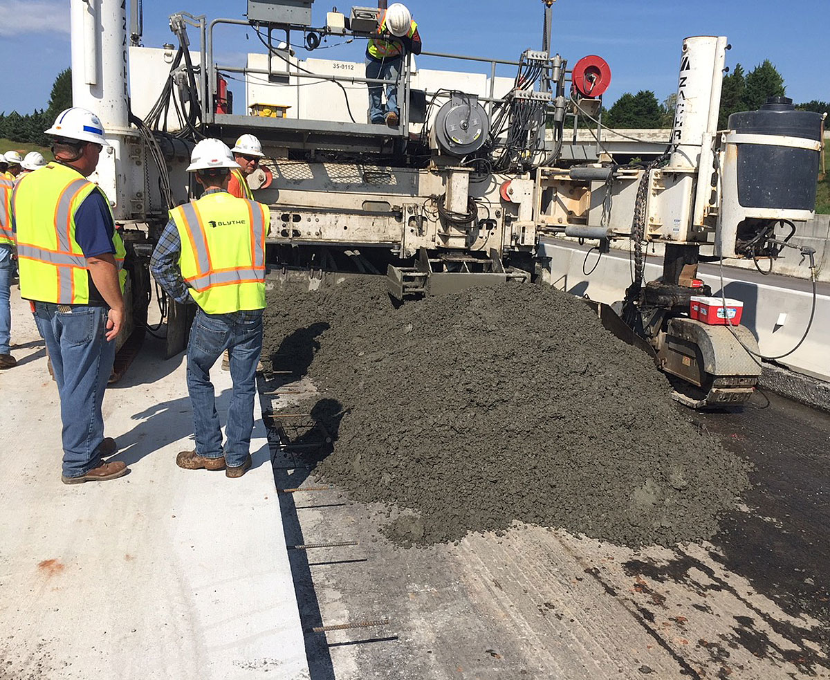 Crews place concrete along 85 SB at Exit 80